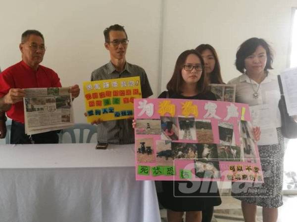 Kim Hooi (tiga dari kiri) bersama ahli-ahli persatuan pencinta haiwan menggesa pihak berkuasa mengambil tindakan segera.