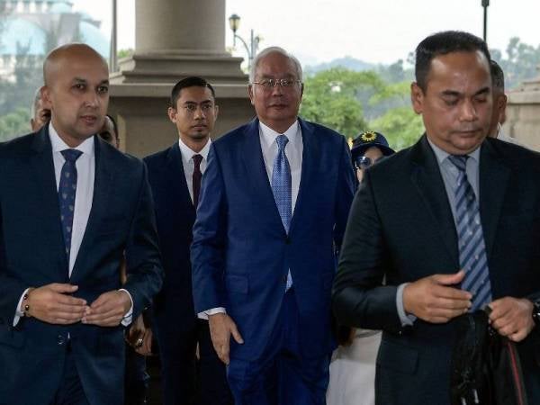 Bekas Perdana Menteri Datuk Seri Najib Tun Razak hadir bagi perbicaraan kes berprofil tinggi 1Malaysia Development Berhad (1MDB) di Kompleks Mahkamah Kuala Lumpur, semalam. - Foto Bernama