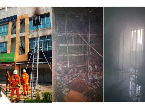 Pasukan bomba menggunakan tangga untuk memadamkan kebakaran di tingkat dua sebuah rumah kedai di Connought Avenue hari ini. (Kesan kebakaran di tingkat dua di rumah kedai di Connought Avenue hari ini.)