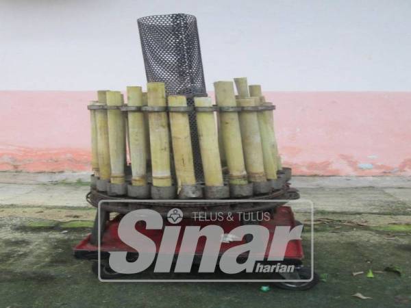 MESIN pembakar lemang berirama yang turut tular dalam media sosial.