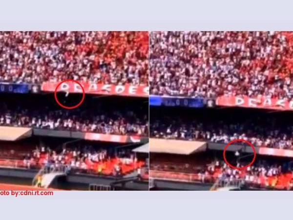 Insiden Lago de Melo Rios (dalam bulatan) terjatuh daripada tingkat tiga stadium tular di internet .