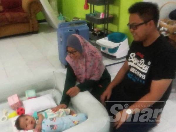 Ahmad Safiuddin dan Nurul Erwani bersyukur dan gembira melihat perkembangan positif Ainul Mardhiah.