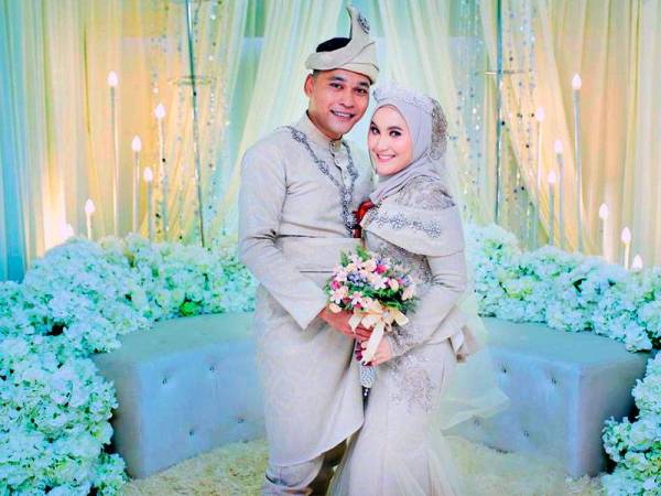 Syarfa dan suaminya, Mohammad Syazwan ketika hari persandingan mereka yang berlangsung pada 14 September lalu.