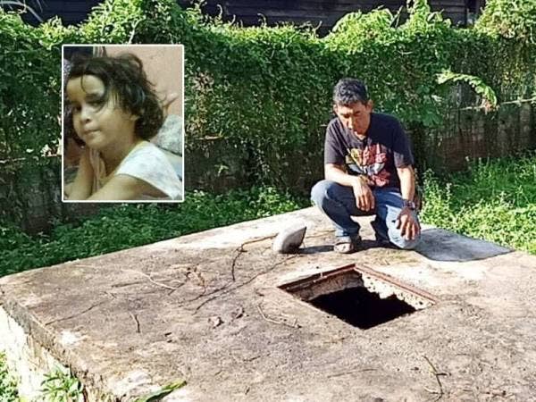 Tuan Zuhri menunjukkan lubang tangki kumbahan tempat Nur ArieSha ditemui terjatuh, malam tadi.