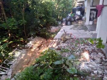 Sistem saliran punca tanah runtuh di Jalan Genting-Amber Court