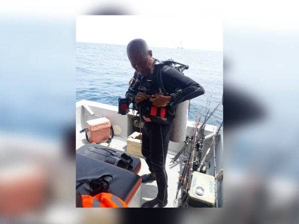 Gambar terakhir Allahyarham sebelum turun menyelam di Pulau Lima kelmarin.
