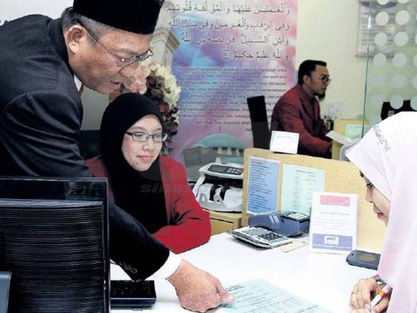 SEBAGAI ketua, ambil peluang bersama staf berkongsi maklumat dan membimbing mereka tidak mengira masa. -Gambar hiasan