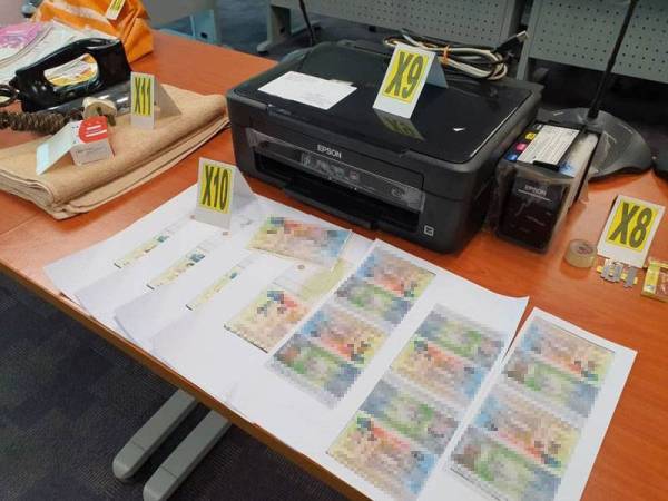 Antara yang dirampas dalam operasi Ops Serkap di sebuah premis di Jalan Lebuh Ampang, Kuala Lumpur, Khamis lalu. - Foto ihsan Jabatan Imigresen Wilayah Persekutuan Kuala Lumpur