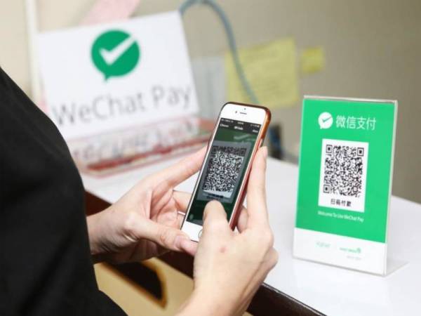 APLIKASI Wechat Pay menjadi pilihan pengguna untuk urus niaga.