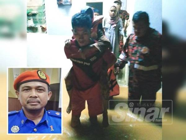 Penduduk berpindah ke PPS di Masjid Kg Cheting, di sini yang dibuka jam 11.30 malam setelah kediaman dinaiki air malam tadi. (Gambar kecil: Che Adam A Rahman)