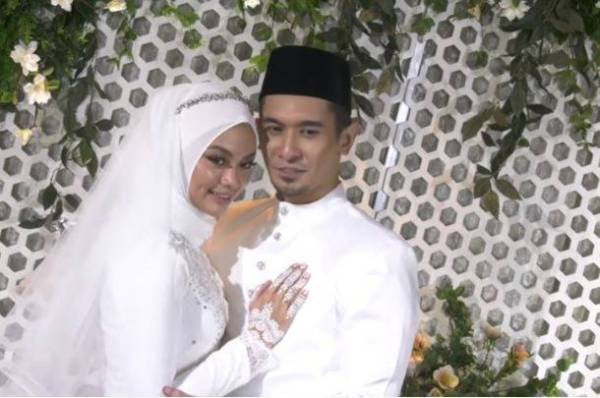 Nazrief Nazri dan isteri, Aizatul Aqma Hamdan.