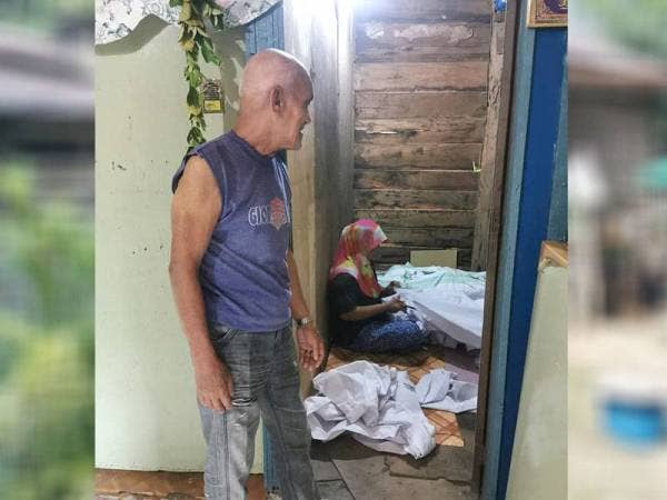 Si suami hiba si isteri meninggal dunia. - Foto Facebook Abam Botak