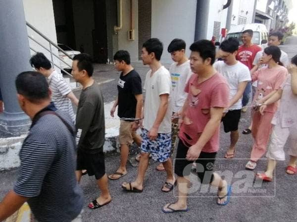 Sebahagian tertuduh warga China dihadapkan ke mahkamah hari ini atas tuduhan menawarkan pinjaman wang tidak wujud secara dalam talian dan perjudian terbuka, November lalu.