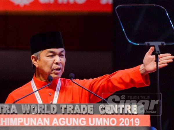 Ahmad Zahid ketika berucap pada Perhimpunan Agung UMNO di PWTC, Kuala Lumpur. - FOTO ZAHID IZZANI