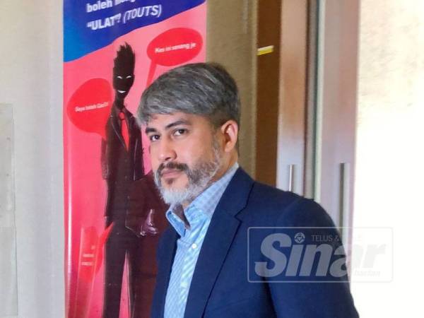 Ahmad Izhan ketika hadir hari kesembilan perbicaraan ke mambabitkan Ahmad Zahid yang menghadapi 47 pertuduhan melibatkan dana Yayasan Akalbudi.