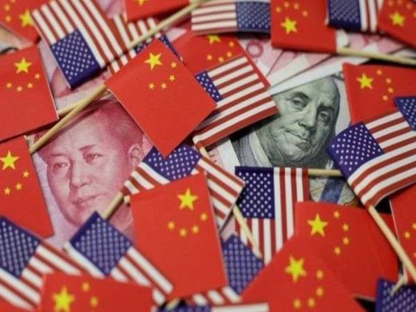 Perjanjian fasa pertama itu akhirnya dicapai selepas perang perdagangan tercetus antara AS-China selama hampir dua tahun. - Foto: Agensi