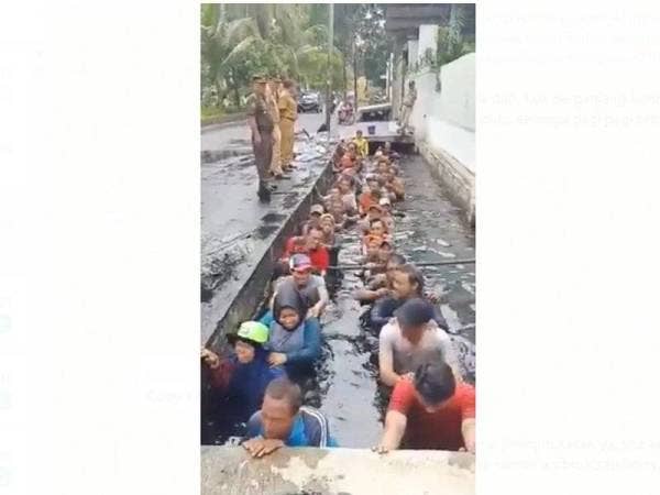 Rakaman video tular menunjukkan kakitangan PPSU berdiri di dalam longkang sebagai syarat untuk melanjutkan kontrak mereka.