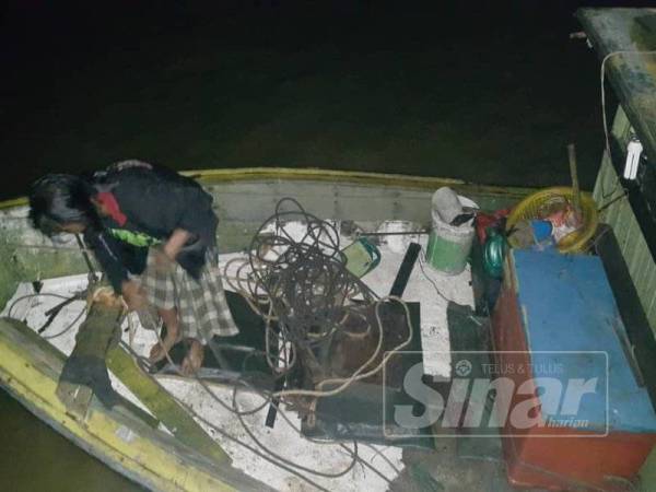 Keadaan bot dinaiki Ahmad Zulhisham dan Ahmad Tarmizi ketika ditemui di tengah laut.