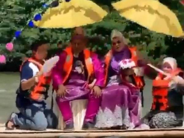 Persandingan unik Meor Shamsuddin dan isteri di atas rakit di Sungai Perak itu tular di media sosial.