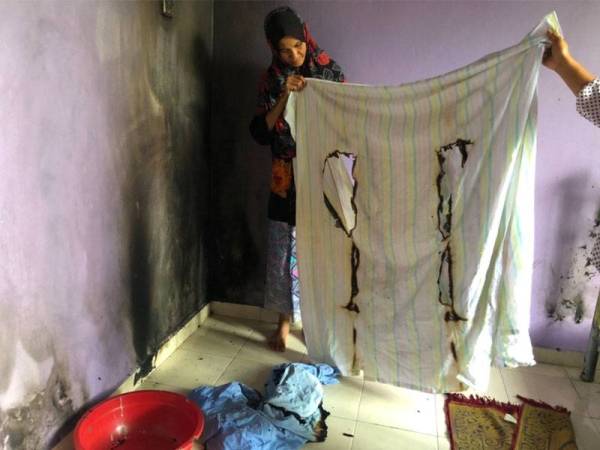 Ropeah menunjukkan selimut yang terbakar secara misteri sebelum ini.