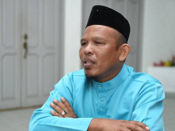 Mohd Fauzi pada temu bual ketika majlis Tilawah AL- Quran Braille di Menara Yayasan Terengganu hari ini. - Foto Bernama