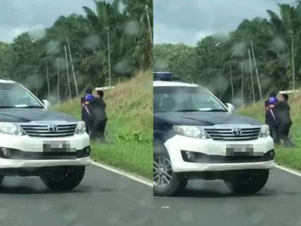 Tangkap layar daripada video tular penunggang motosikal dipukul individu dipercayai pegawai JPJ.