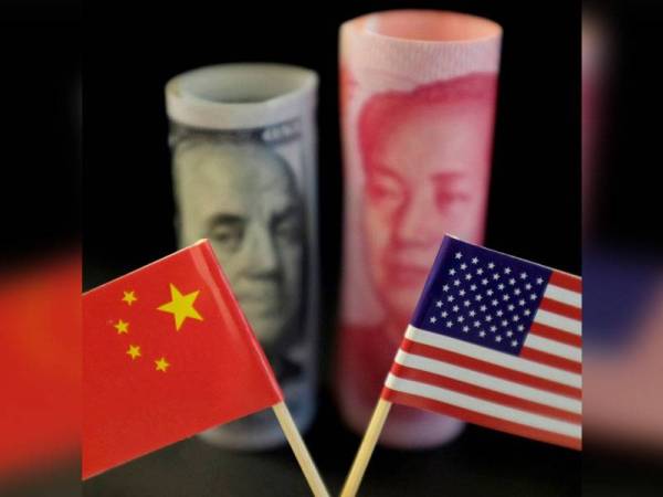 China dan AS sepakat untuk meredakan perang tarif yang berlarutan selama hampir dua tahun. - Foto Agensi