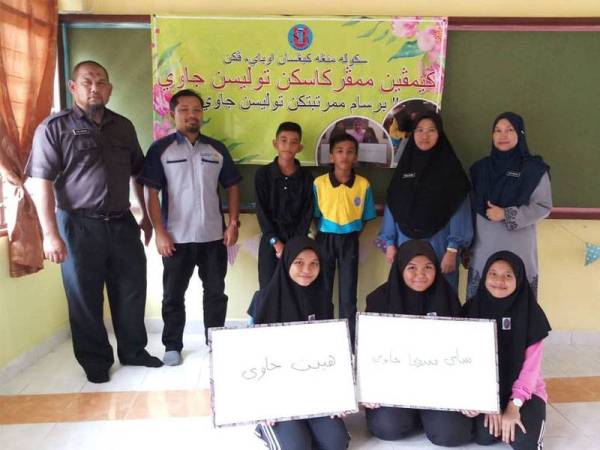 Sebahagian peserta yang menyertai Kempen Memperkasakan Tulisan Jawi SMK Ubai.