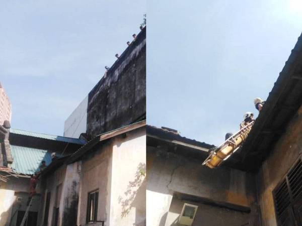 Anggota bomba menjalankan kerja menyelamat mangsa.