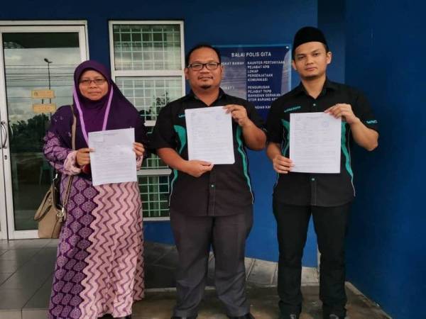Wakil Yadim Sarawak menunjukkan laporan polis dibuat di Balai Polis Gita, Kuching pada 29 Januari lalu bagi menafikan dakwaan yayasan itu terlibat program pemberian sumbangan pendidikan kepada anak-anak bumiputera negeri itu bagi tujuan mengislamkan mereka.
