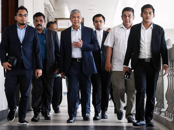 Ahmad Zahid yang berdepan 47 pertuduhan melibatkan puluhan juta ringgit dana milik Yayasan Akalbudi hadir pada perbicaraan kesnya di Mahkamah Tinggi hari ini.  - Foto Bernama
