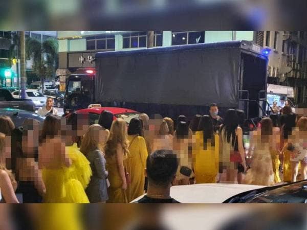 Antara wanita warga asing yang tahan dalam operasi di pusat hiburan di ibu negara awal pagi hari ini.