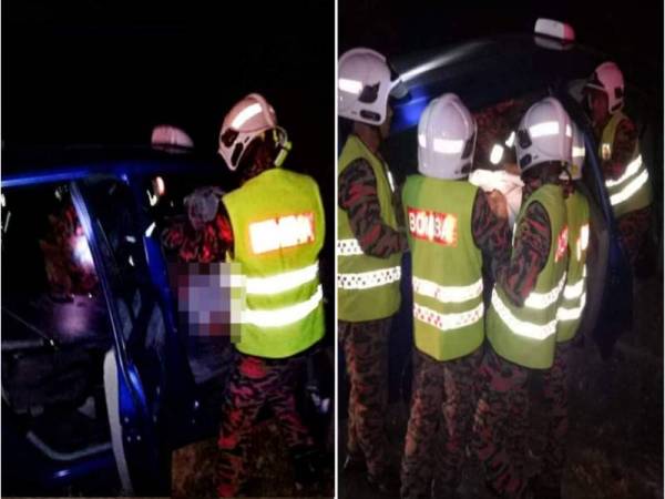 Anggota bomba membantu mengeluarkan mayat mangsa yang tersepit dalam nahas di Lebuh Raya CSR, Lipis kelmarin.