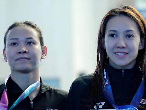 Pandelela Rinong (kiri) dan Leong Mun Yee. - Foto fail