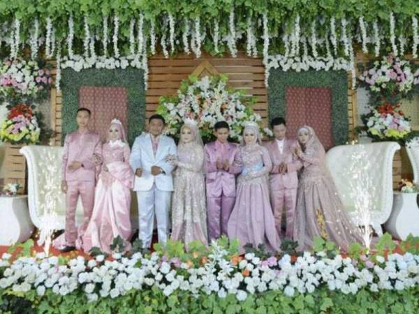 Empat beranak sanding bersama mencuri perhatian netizen di laman sosial. - Foto Kompas