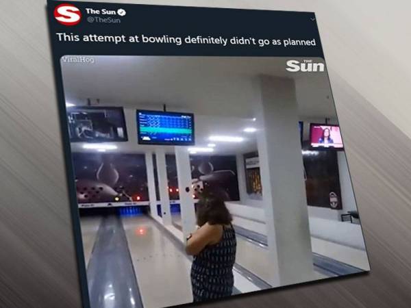 Paparan Twitter The Sun menunjukkan wanita membaling bola, namun tersasar mengena televisyen.