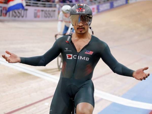 Azizulhasni ketika meraih gangsa dalam acara pecut 200 meter (m) individu di Kejohanan Berbasikal Trek Dunia di The Velodrom, Berlin, Jerman 1 Mac lalu. - Foto AFP