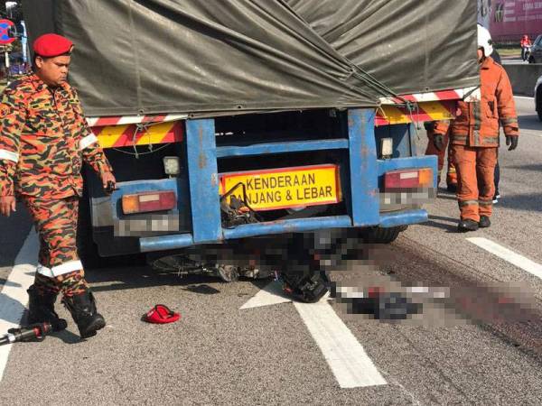 Mangsa yang parah maut di tempat kejadian selepas digilis dan diseret sejauh 25 meter dalam kejadian pagi tadi.