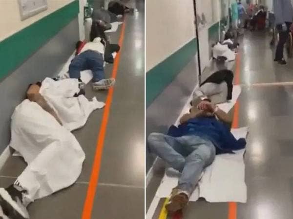 Keadaan pesakit menunggu giliran ekoran terlalu ramai menerima rawatan di hospital. - Foto Daily mail