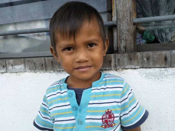 Anak sulung mangsa, Muhammad Afip yang terselamat dalam kejadian itu.