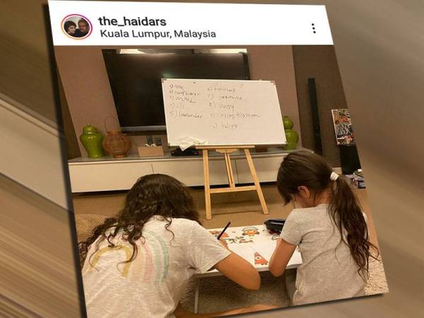 Anak-anak Que Haidar memanfaatkan PKP dengan melukis bersama bapa mereka