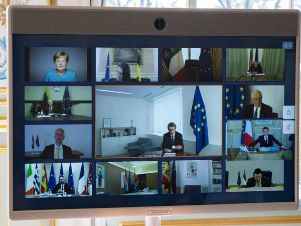 Ahli Majlis Negara Eropah menghadiri mesyuarat secara sidang video bersama Presiden Perancis, Emmanuel Macron. - Foto EPA