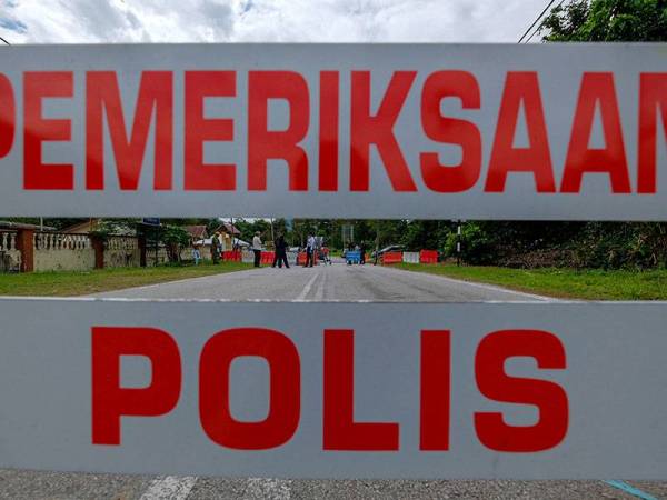 Keadaan semasa di kawasan sekitar sekatan jalan raya yang dilakukan Polis Diraja Malaysia (PDRM) di Kampung Sungai Lui Batu 21 hari ini. - Foto Bernama