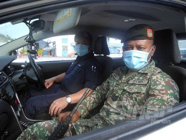 Setiap kereta peronda di Petaling Jaya akan mempunyai petugas anggota ATM.FOTO: ROSLI TALIB