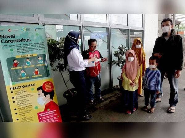 Jumlah kes positif Covid-19 di Indonesia meningkat kepada 13,112 kes. - Foto Anadolu Agency