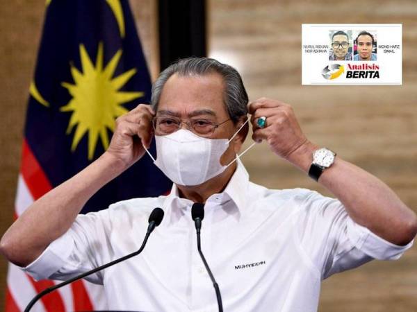 Tan Sri Muhyiddin Yassin selepas selesai Perutusan Khas Perdana Menteri. - Foto Bernama