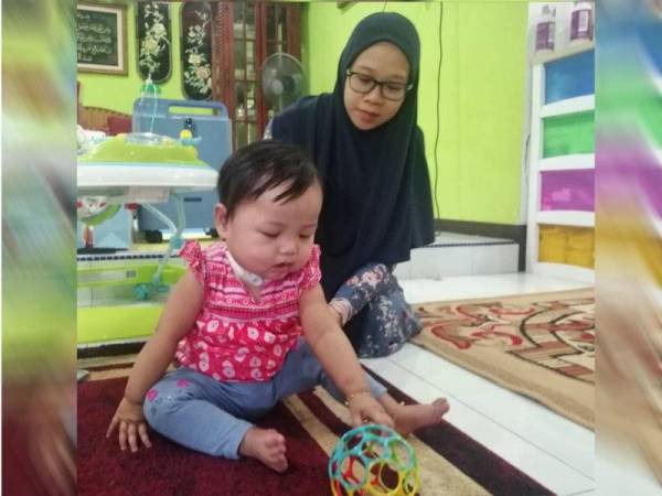 Ainul akan bergelar kakak tidak lama lagi.