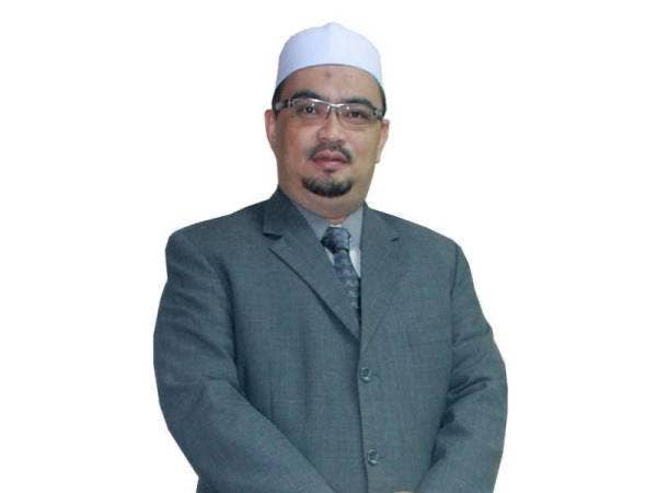  Dr Mohamed Fadzli Datuk Hassan