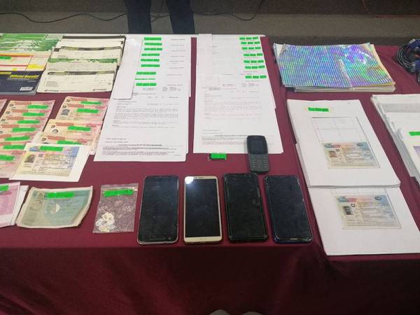 Antara dokumen saringan ujian Covid-19 palsu yang dirampas polis dalam serbuan di sekitar Klang dan Shah Alam.