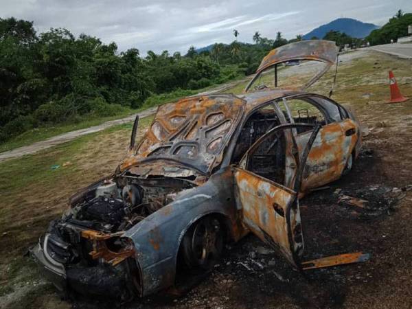 Keadaan kereta milik pekebun sayur yang dibakar